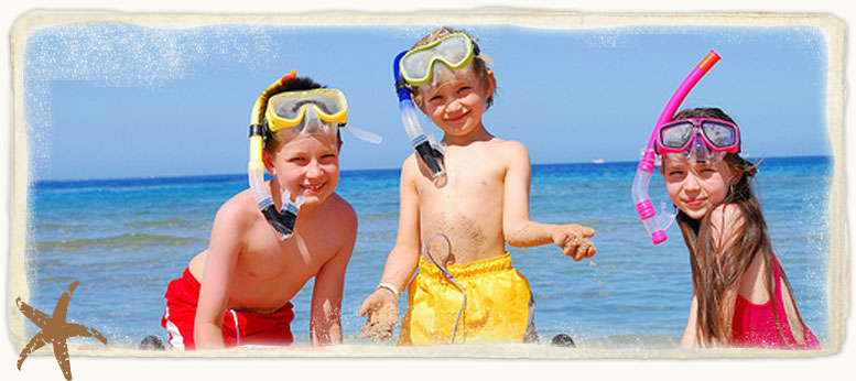 three kids on the beach